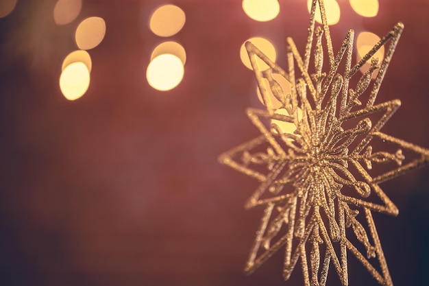 Free Photo christmas background with decorative star with bokeh lights