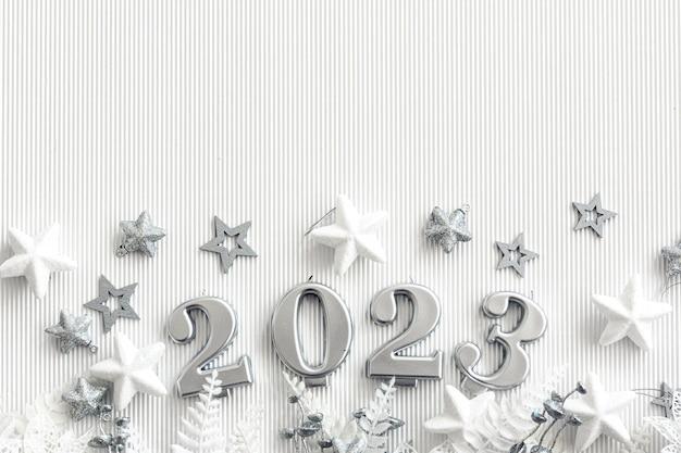 Free Photo christmas background with numbers 2023 and decor on a white background