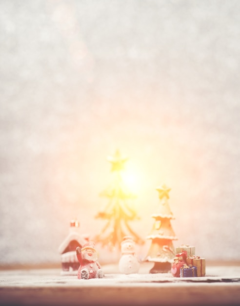 Free photo christmas background with santa claus and a snowman