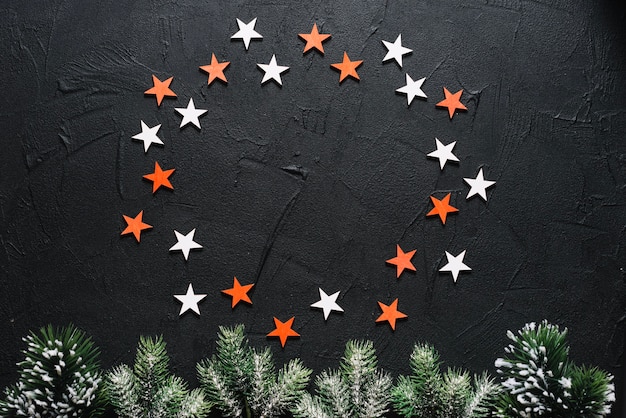 Free Photo christmas background with stars forming circle