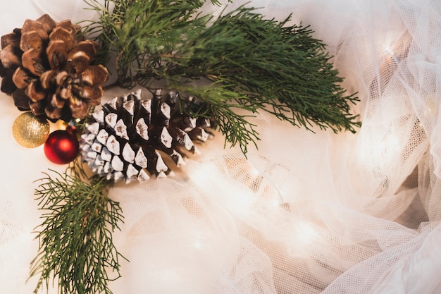 Free photo christmas background with two pine cones