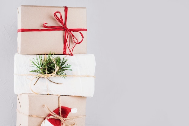 Free photo christmas boxes wrapped in kraft paper