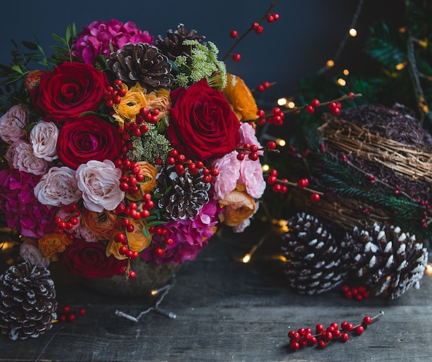 Free photo christmas color bouquet with xmas lights and ornaments