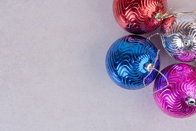 Christmas colourful balls on white surface