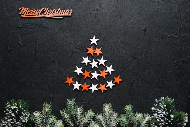 Free photo christmas composition of stars forming tree