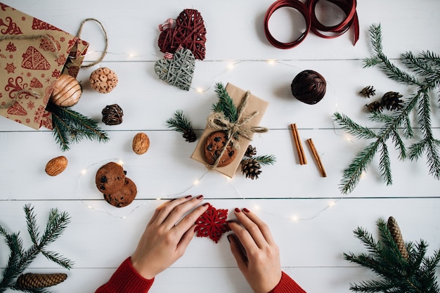 Free photo christmas composition on white wooden table.