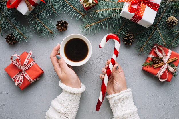 Christmas composition with coffee and candy cane