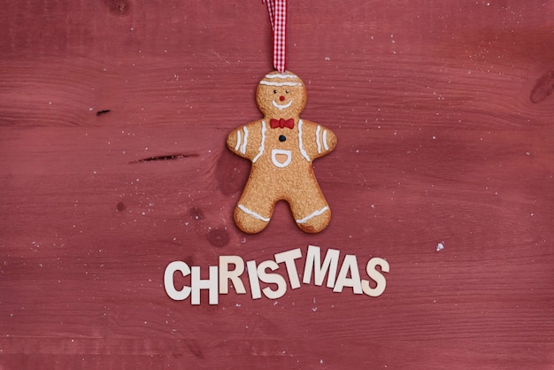 Free Photo christmas composition with gingerbread man