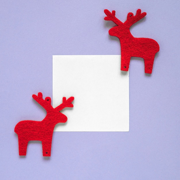 Free Photo christmas composition with paper and reindeers