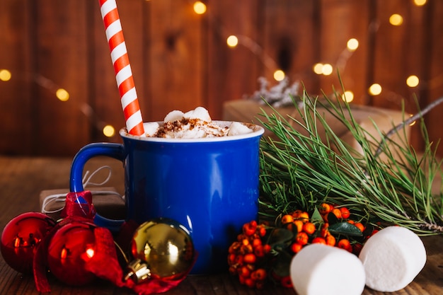 Free photo christmas composition with straw in mug