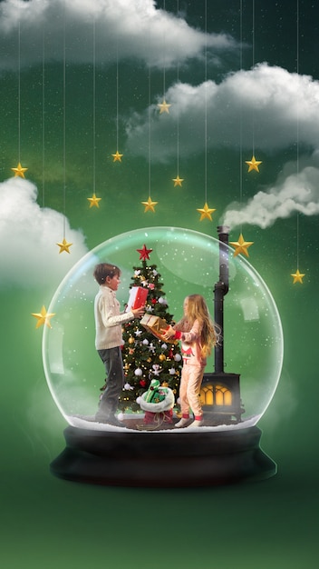 Free photo christmas composition with xmas scene in snow globe