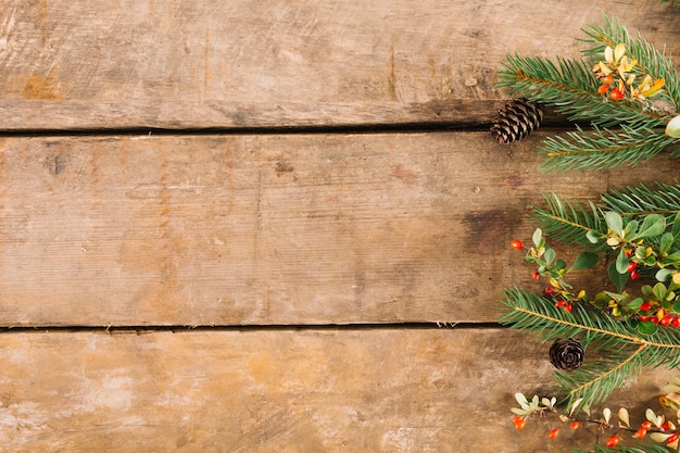 Free photo christmas composition on wooden texture