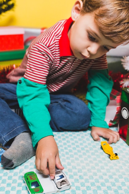 Free Photo christmas concept with boy playing