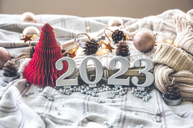 Christmas cozy background with numbers 2023 and decor details