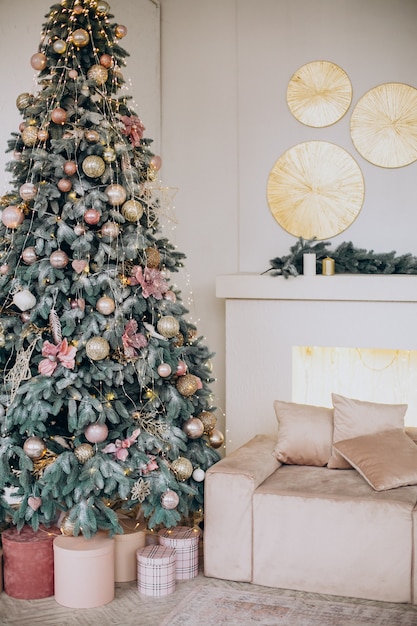 Christmas decorations and christmas tree in room