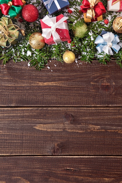 Free photo christmas decorations on wooden background