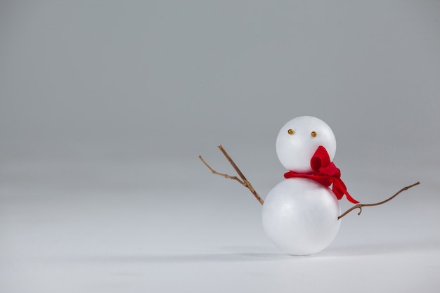 Free Photo christmas dolls on a gray background