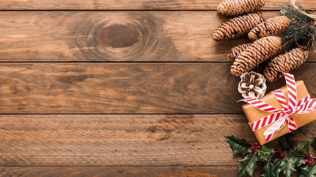 Christmas gift box with big cones 