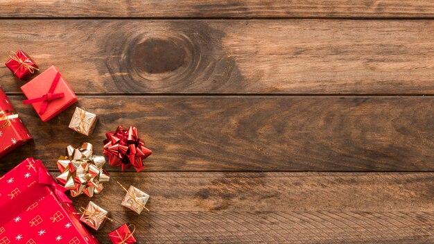 Christmas gift boxes with bows on table 