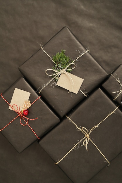 Christmas gifts with black wrapped paper