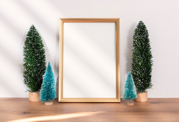 Christmas holiday greeting frame design mockup with decoration on wood table.