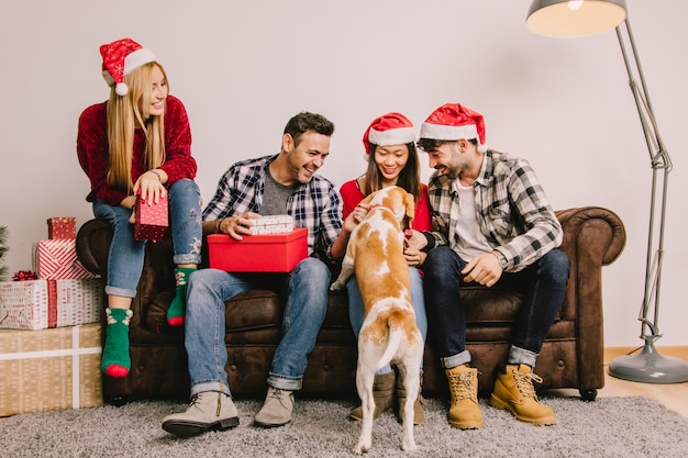 Free Photo christmas present concept with persons and dog