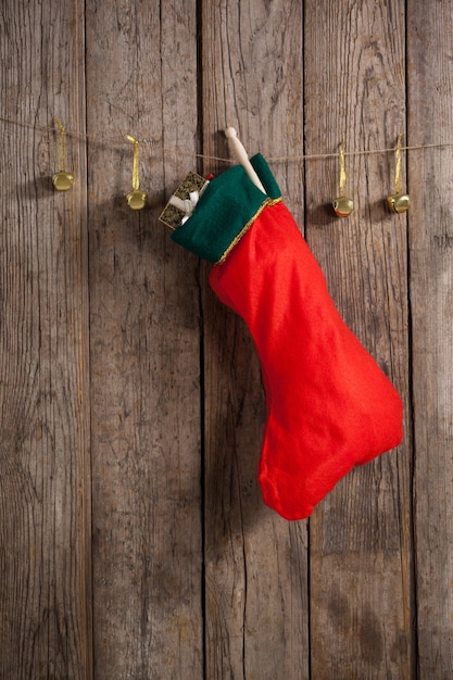 Free Photo christmas red sock hanging from a rope