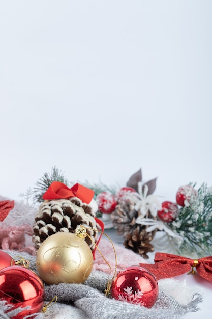 Christmas shiny baubles on white surface