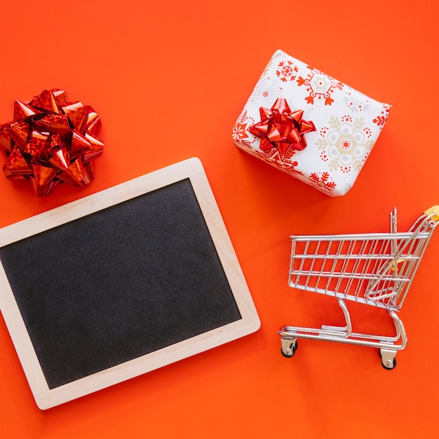 Christmas shopping concept with slate