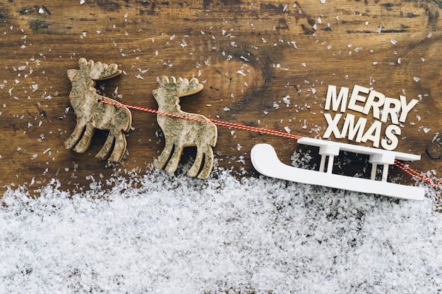 Free photo christmas snow decoration with sleigh