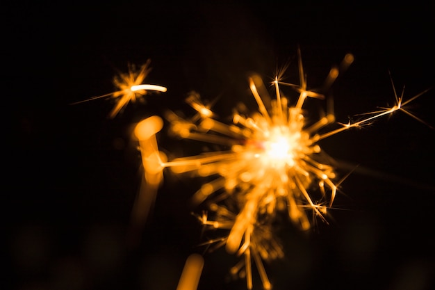 Christmas sparkler on dark background