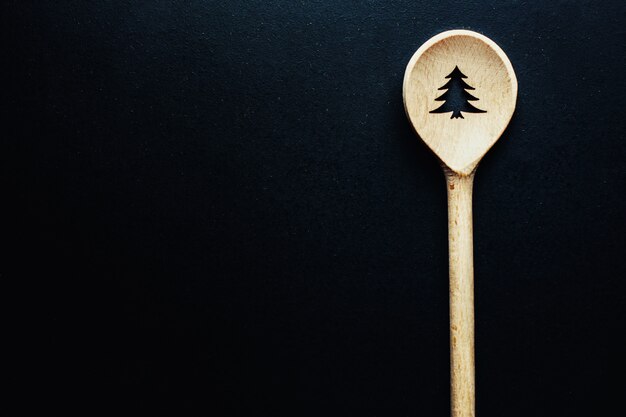 Christmas spoon on dark table