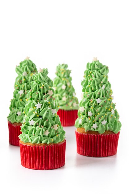 Christmas tree cupcakes isolated on white background