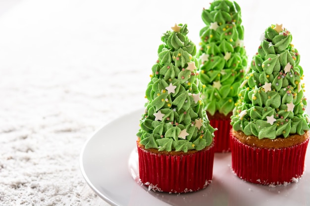 Christmas tree cupcakes on snow