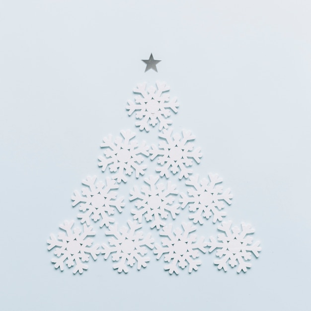 Free Photo christmas tree made from white snowflakes 