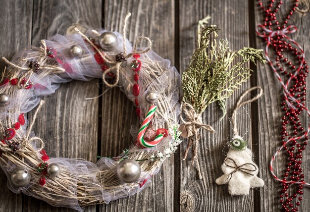 Christmas wreath on wooden background