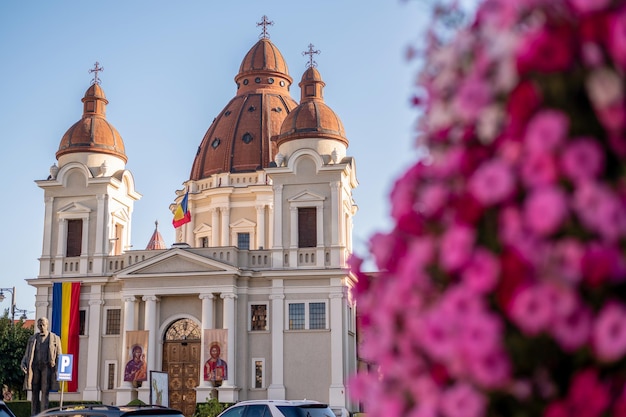 Church of the Annunciation and Statue of Emil Dandea of Targu Mures Romania