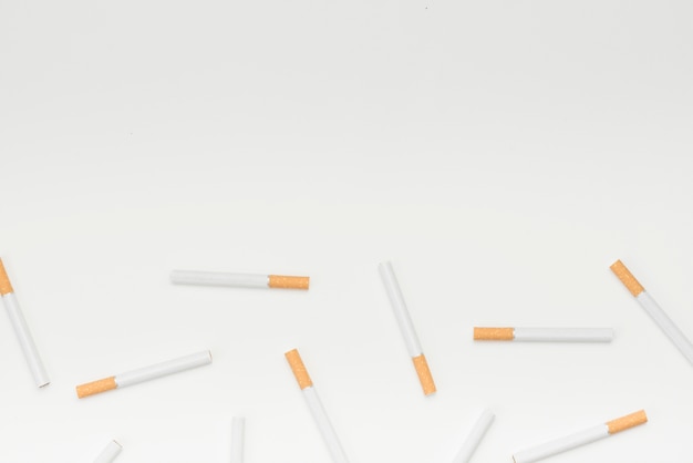 Cigarettes on white background with copy space for text message