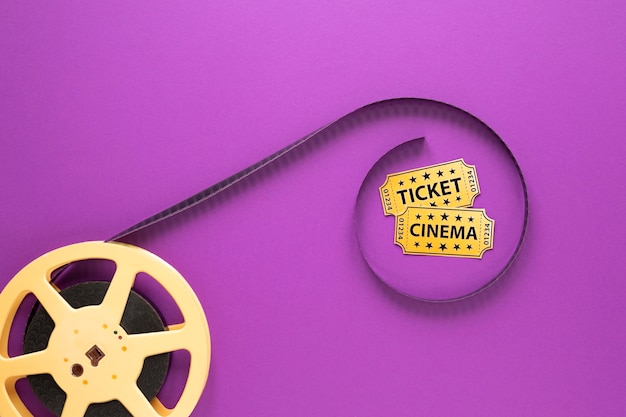 Free photo cinema elements on purple background