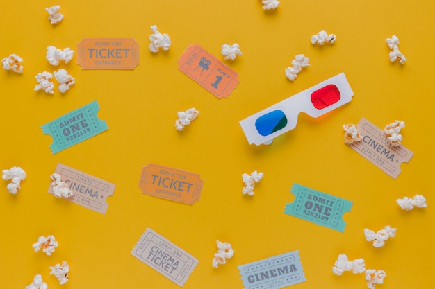 Cinema tickets with popcorns and 3d glasses