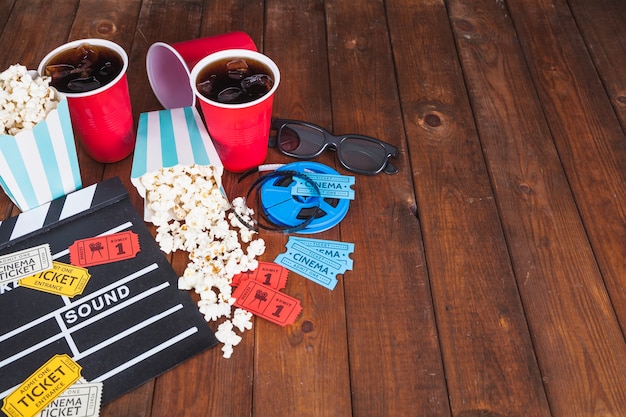 Free photo cinema visit stuff on wooden tabletop