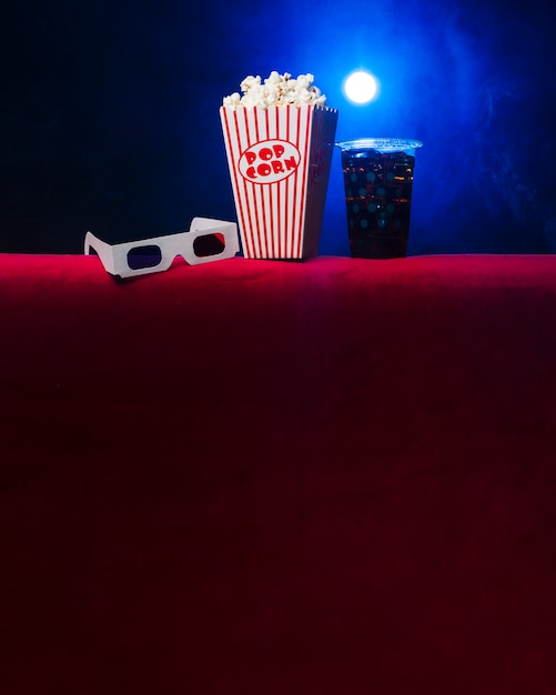 Cinema with popcorn box and 3d glasses