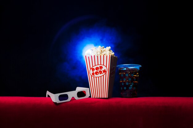 Cinema with popcorn box and 3d glasses