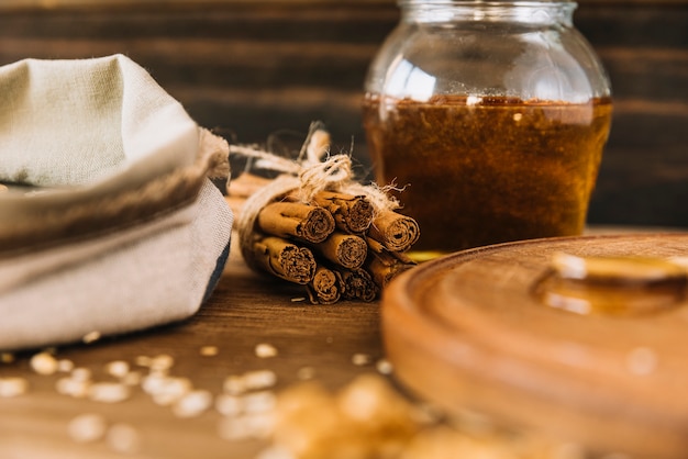 Cinnamon and jar of honey