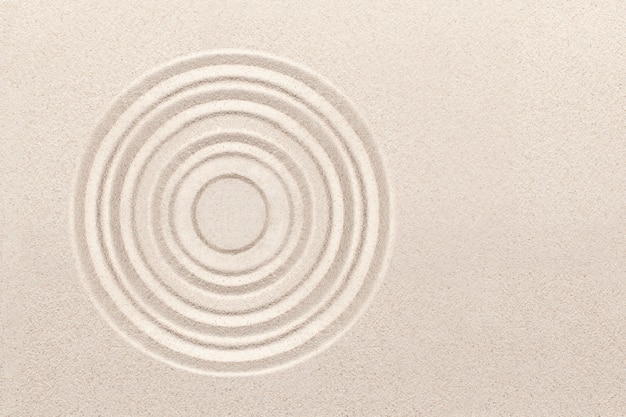 Free photo circle zen sand background in mindfulness concept