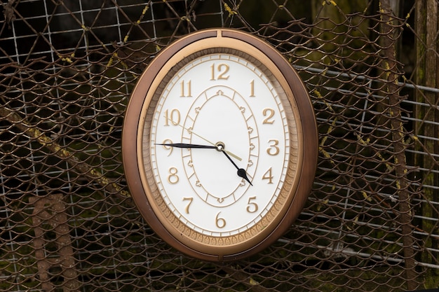 Circular clock outdoors still life