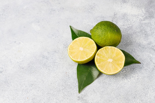 Free photo citrus background with assorted fresh-citrus fruits