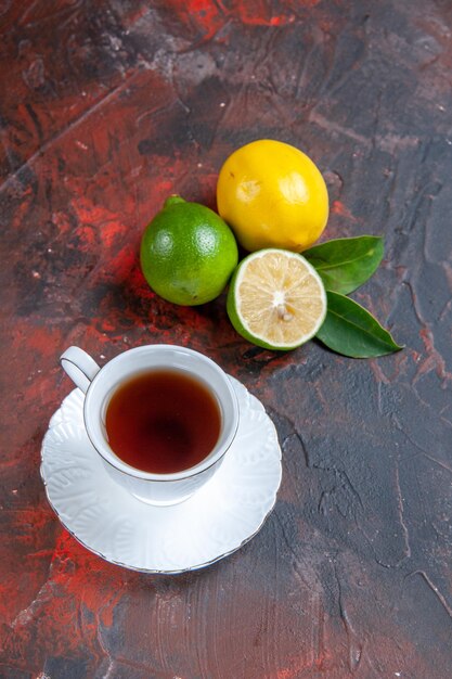 citrus fruits citrus fruits with leaves a cup of tea