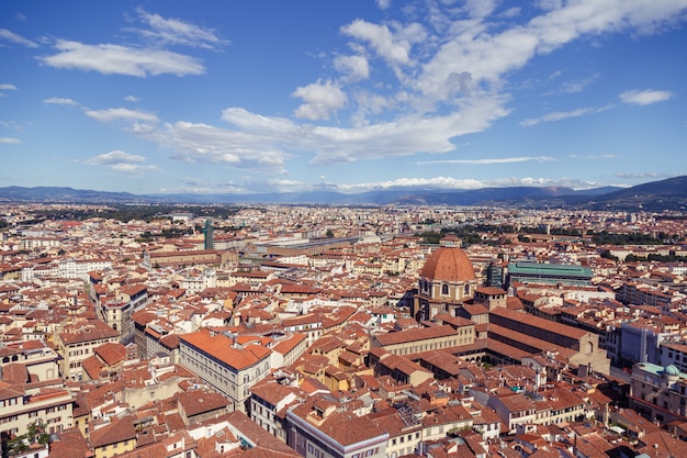 Cityscape in San Lorenzo, Italy with a lot of buildings and a chapel