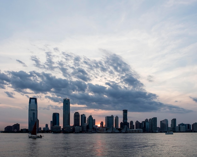 Free Photo cityscape with big buildings and water